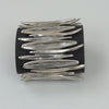 Hevi Brede Elastische Armband – Sculpturale Segmenten