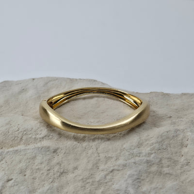 Goudkleurige Twisted Bangle